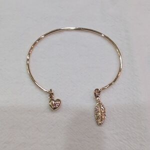 Noonday Collection Freedom Bracelet Elegant Gold Bangle with Heart and Feather